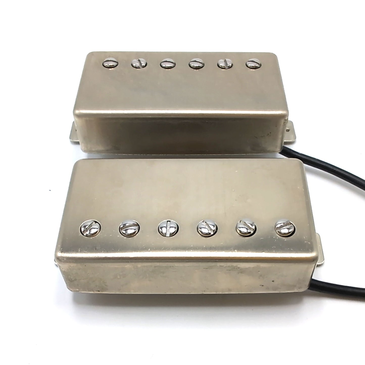 Set of two humbuckers with raw nickel covers and modern shielded 4 conductor lead wire