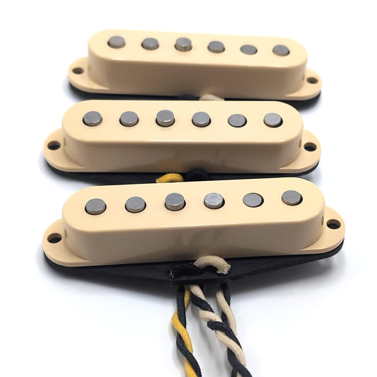 Three vintage pro pickups with cream covers