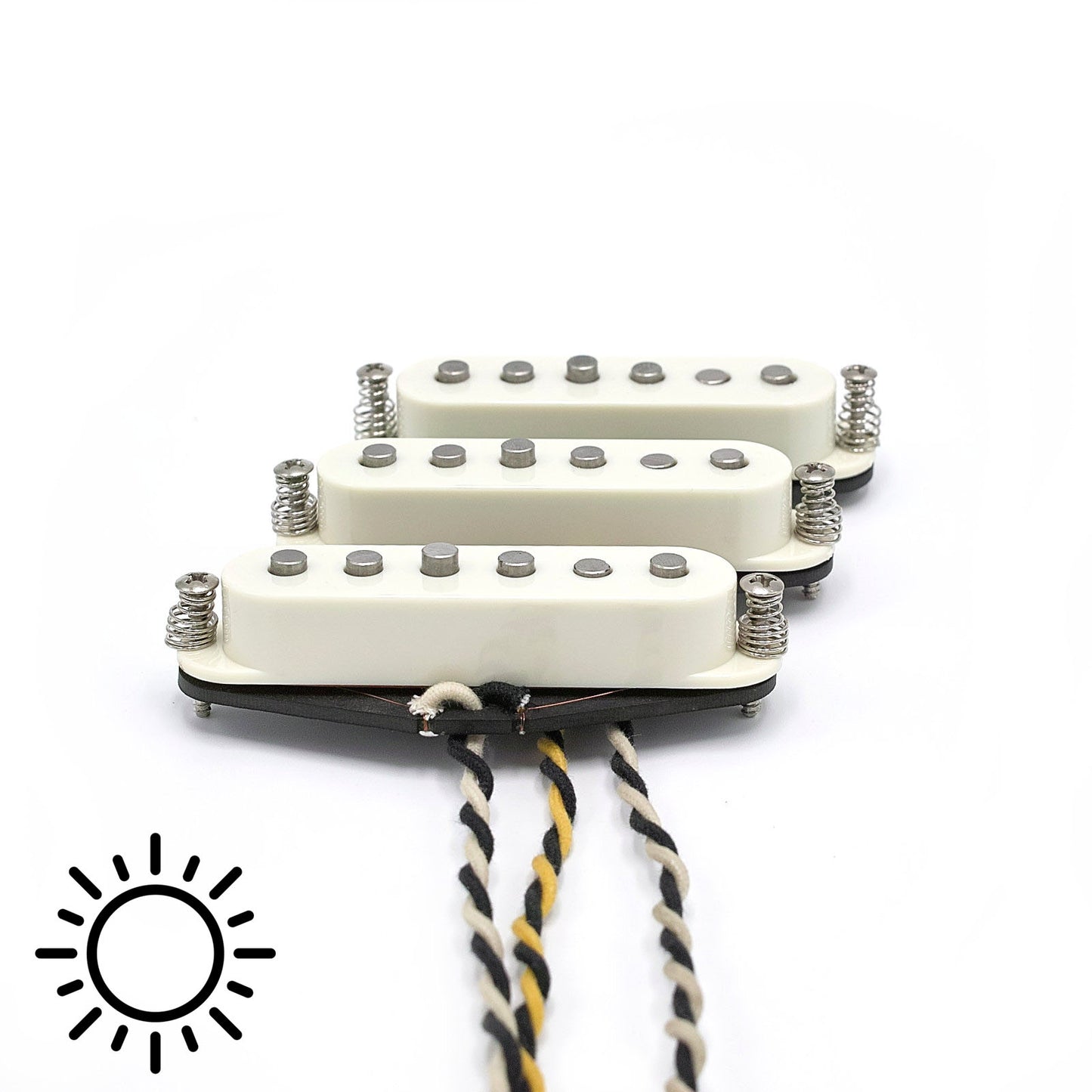 Three pickups for S-style electric guitars with vintage staggered poles and parchment covers