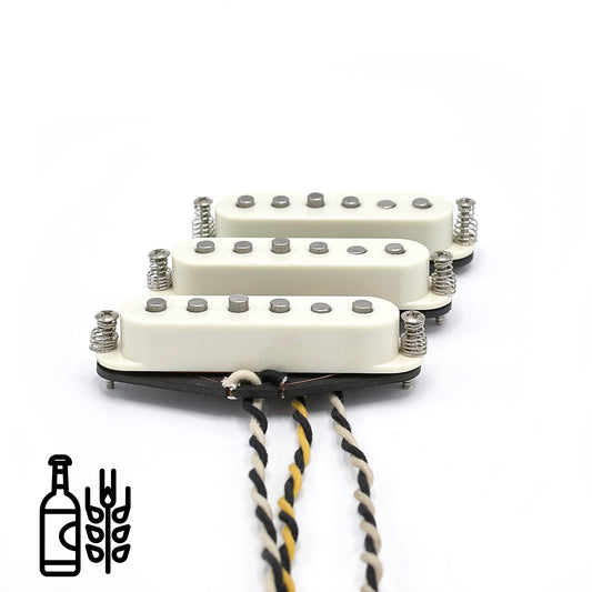 Three pickups for S-style guitars with vintage staggered poles and parchment covers